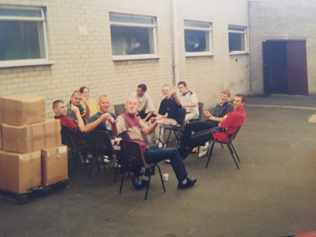 Scott and colleagues sat outside the nylon bobbin factory